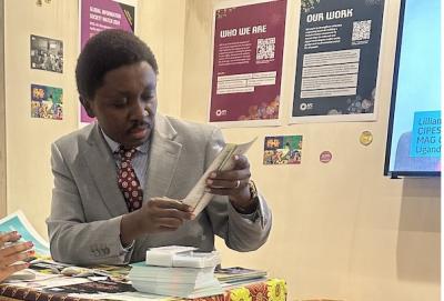 Arsène Tungali at the APC booth during IGF 2025 image linking to IGF 2025: Thinking about the sustainability and future of national and regional initiatives